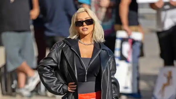 Christina Aguilera Wears a Mouth Print Mini Skirt and Thigh-High Boots to Jimmy Kimmel Show