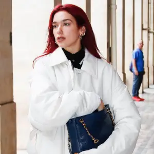 Feature Dua Lipa Unveils Moody Red Hair After Wiping Instagram