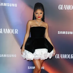 Halle Bailey Blooms in Fitted Floral Dress