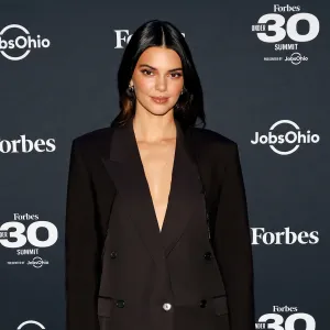 Kendall Jenner Goes Topless Under Modest Skirt Suit at Forbes 30 Under 30 Summit