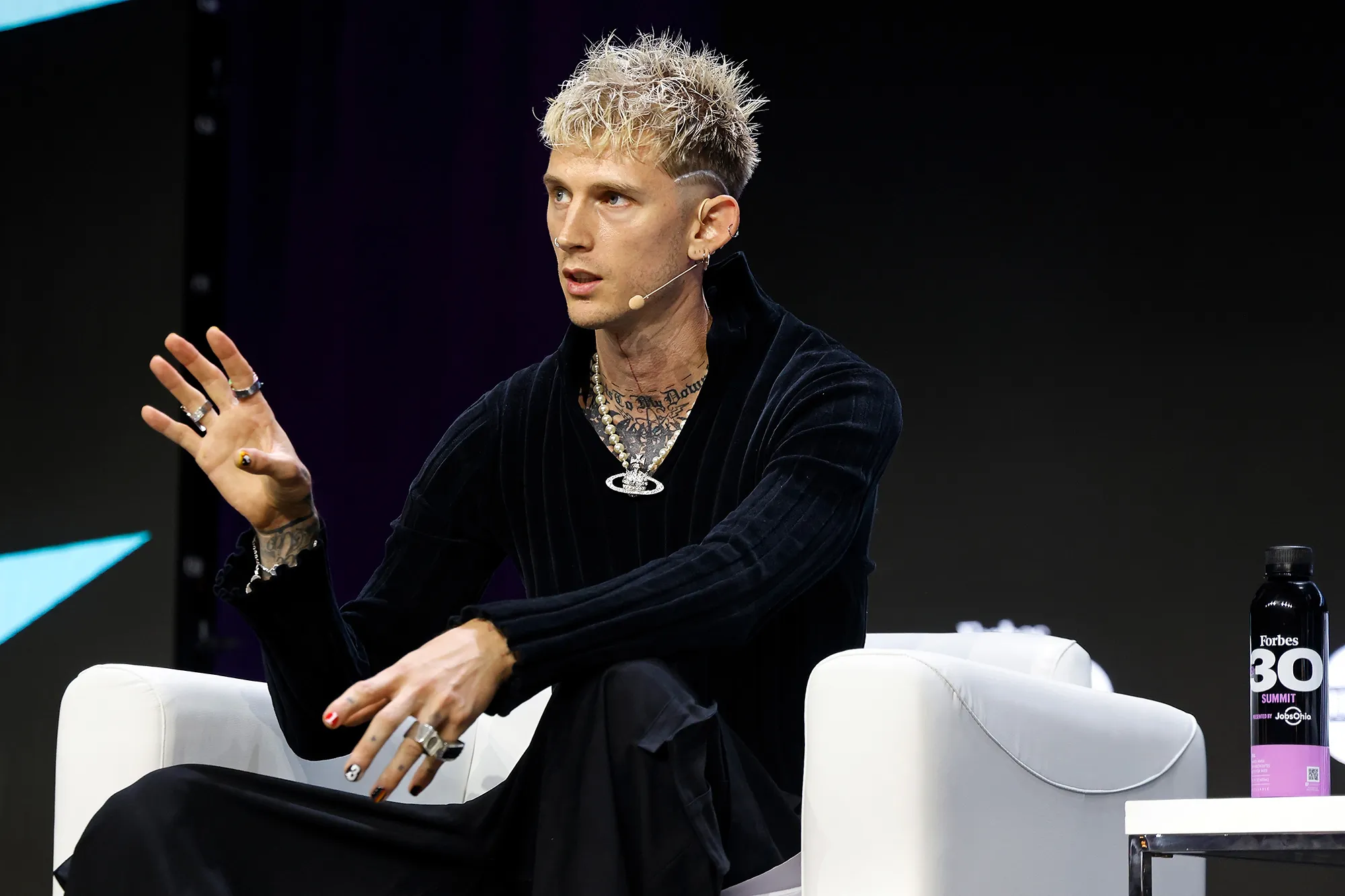 Machine Gun Kelly Apologizes For &lsquo;Primal&rsquo; Reaction After a Fan Storms the Stage: 'Get the F--k Away'