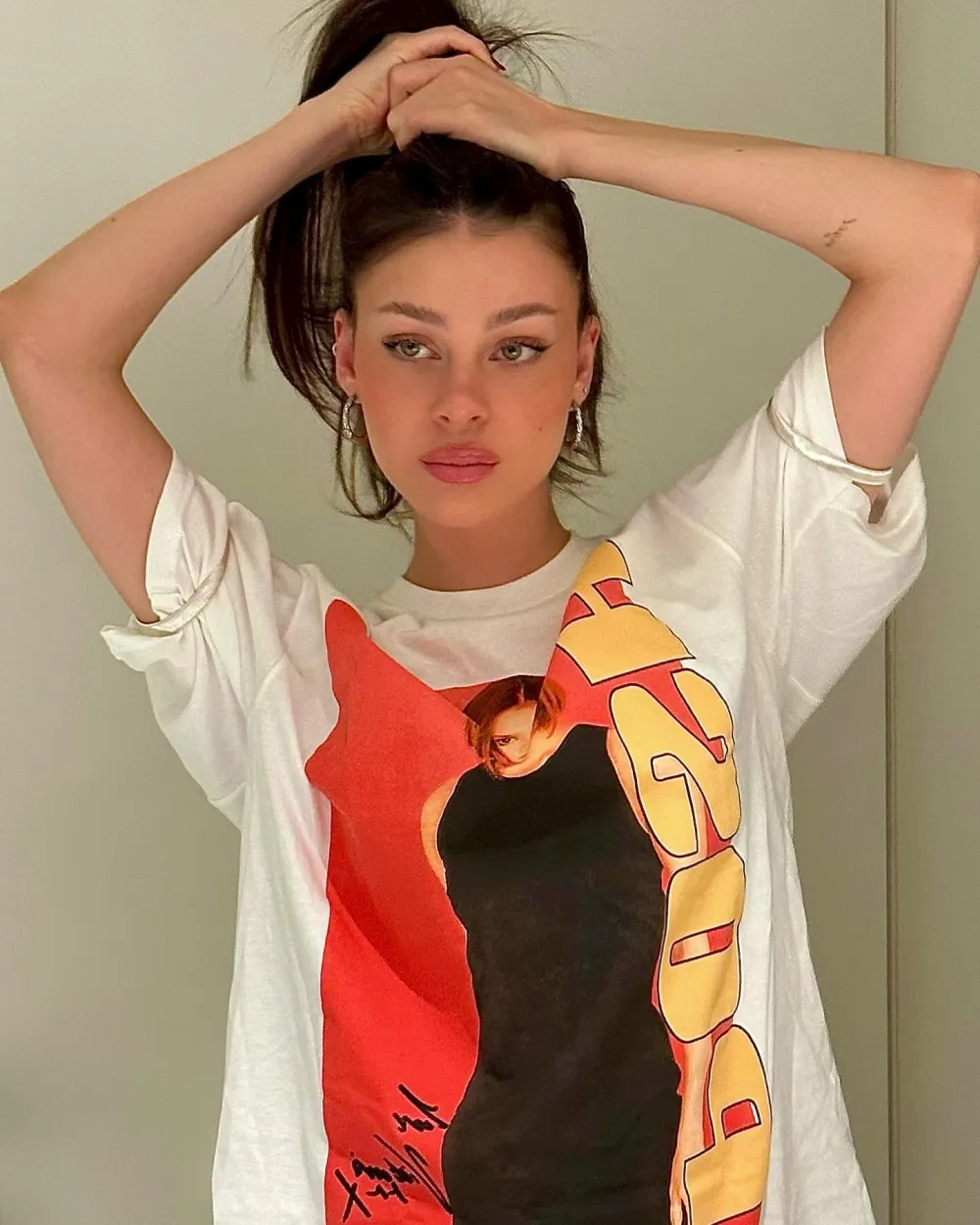 Nicola Peltz Pays Tribute to Mother in Law Victoria Beckham While Wearing Posh Spice T Shirt