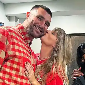 Taylor Swift Kisses Travis Kelce on the Cheek in New Photos From Chiefs Celebration 299