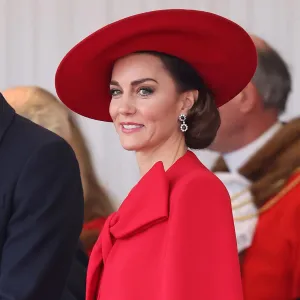 Feature Kate Middleton Looks Festive in Red Statement Coat to Greet the South Korean President and His Wife