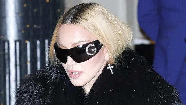 Madonna Steps Out in Fishnet Tights and Slouchy Boots in Milan After Celebration Tour Show