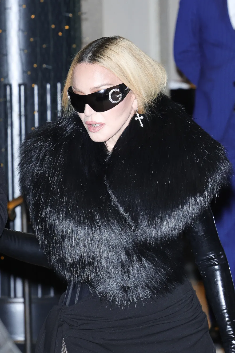 Madonna Steps Out in Fishnet Tights and Slouchy Boots in Milan After Celebration Tour Show