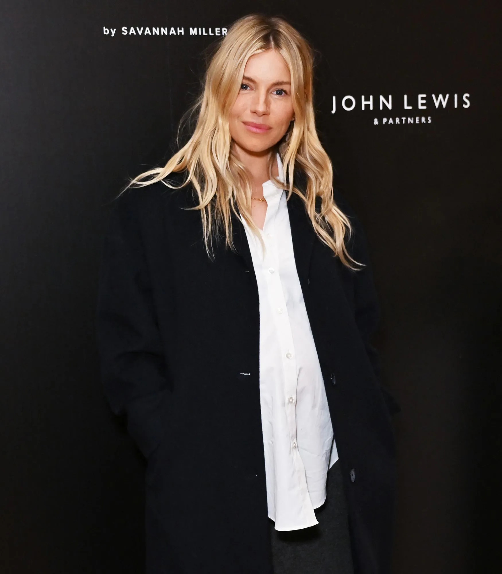 Sienna Miller Stylishly Conceals Baby Bump in Oversized Ensemble