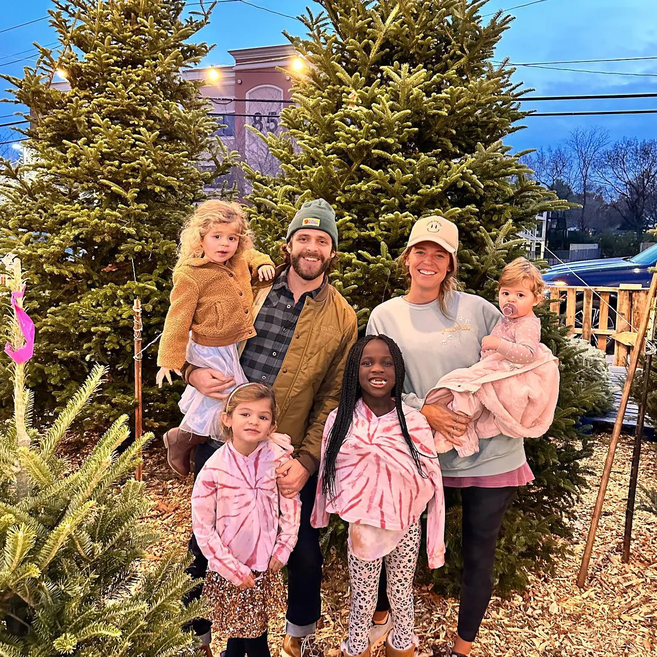 Thomas Rhett and Lauren Akins Have the Perfect Solution to Get Kids to Smile for Holiday Card Shoot