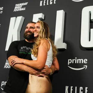 Jason Kelce poses for a photo with Kylie Kelce during the Kelce documentary premiere