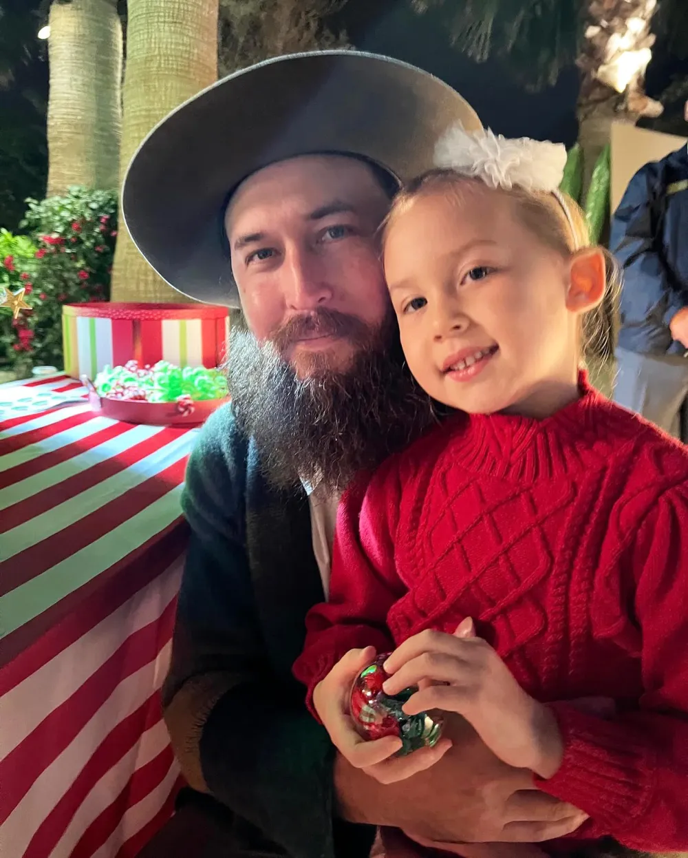 Kate Hudson Lays a Kiss on Danny Fujikawa While Matching in Festive Christmas Pajamas