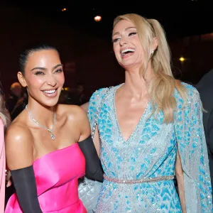 Kim Kardashian and Paris Hilton Go Sledding in Gowns at Epic Holiday Bash