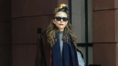 Mary Kate Olsen Steps Out in Understated Dressing Outfit During Rare Outing