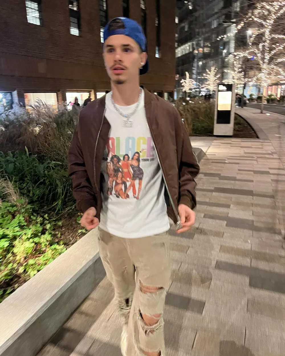 Romeo Beckham Wears Victoria Beckham T-Shirt