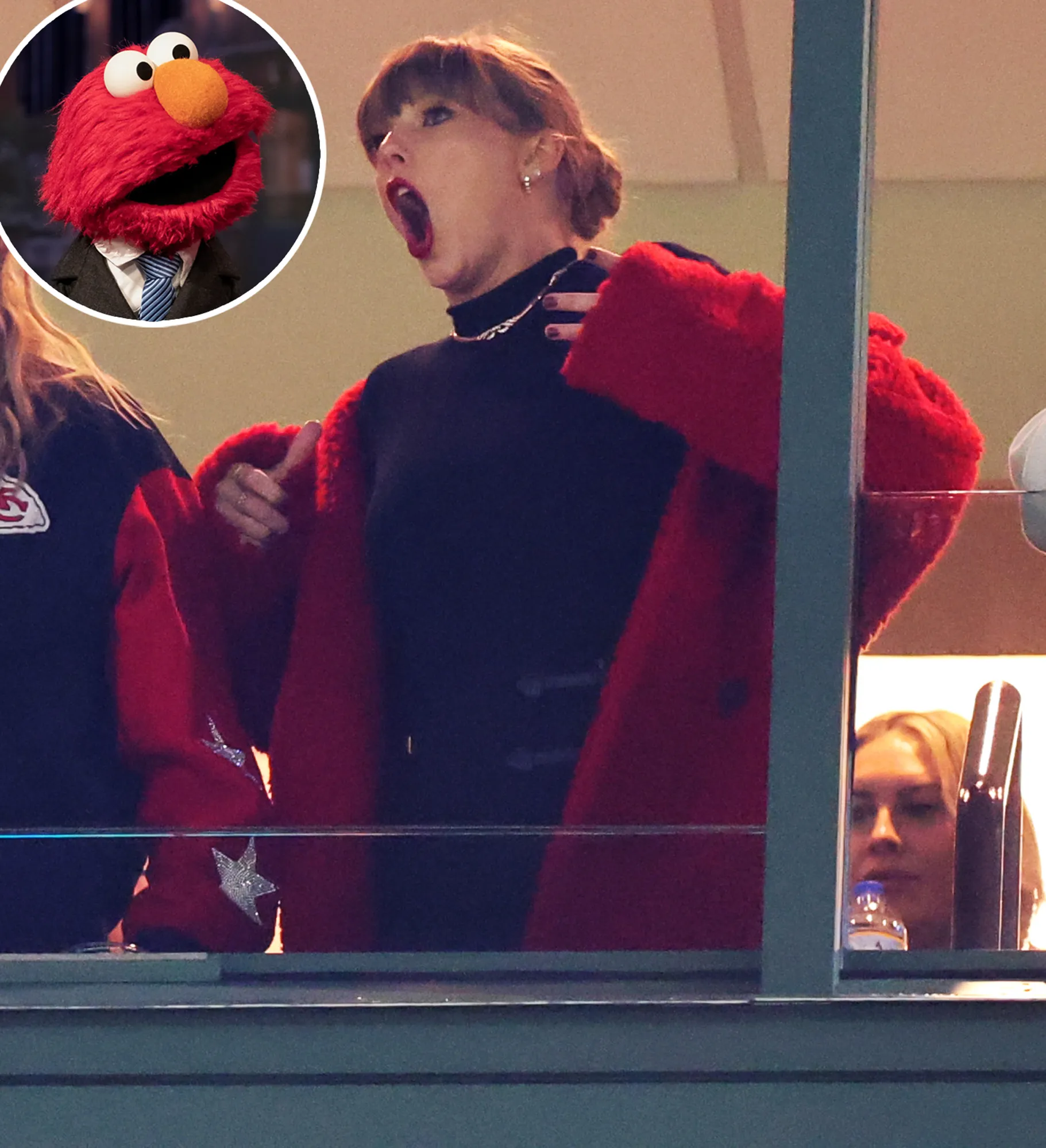 Taylor Swift Red Teddy Coat She Wore to the Chief Game Is Officially Approved by Elmo 1