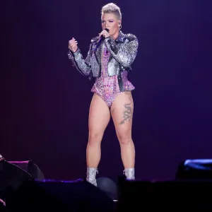 Pink Sings While She and Her Family Light Their Menorah on 1st Night of Hanukkah