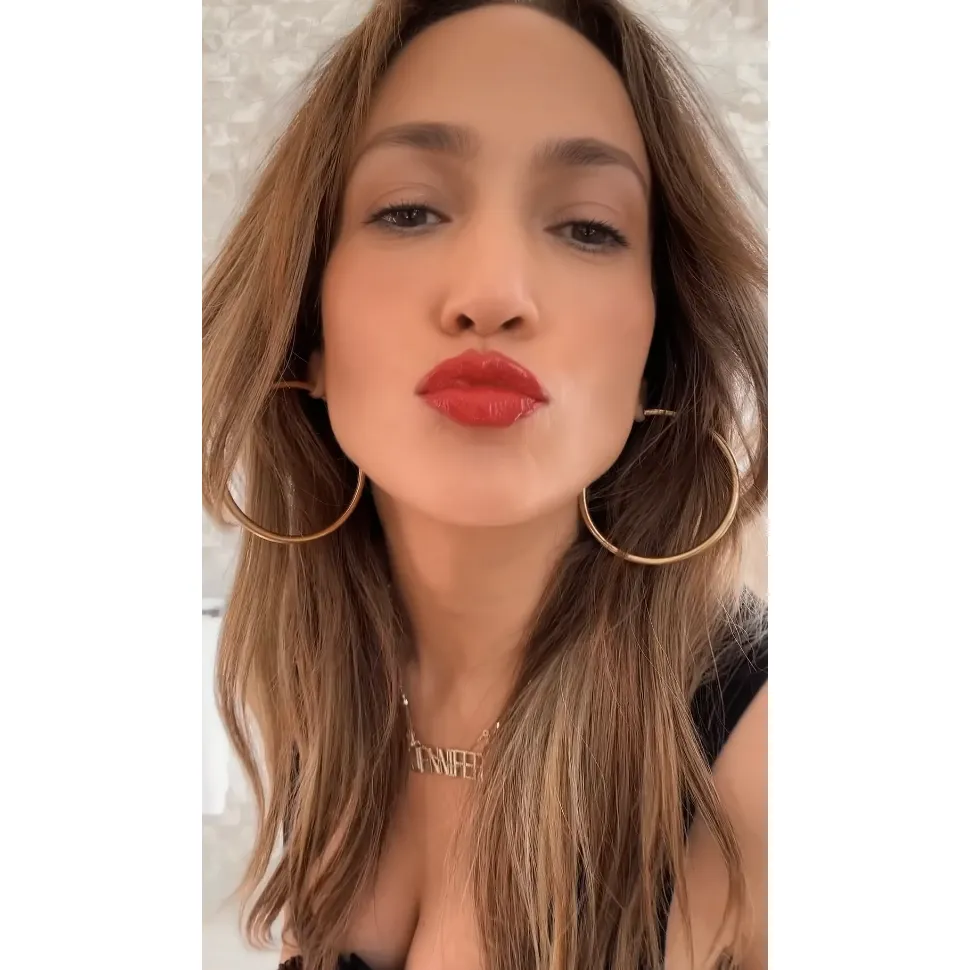 Jennifer Lopez Gives Red Lip Tutorial and Cites Taylor Swift as Inspo