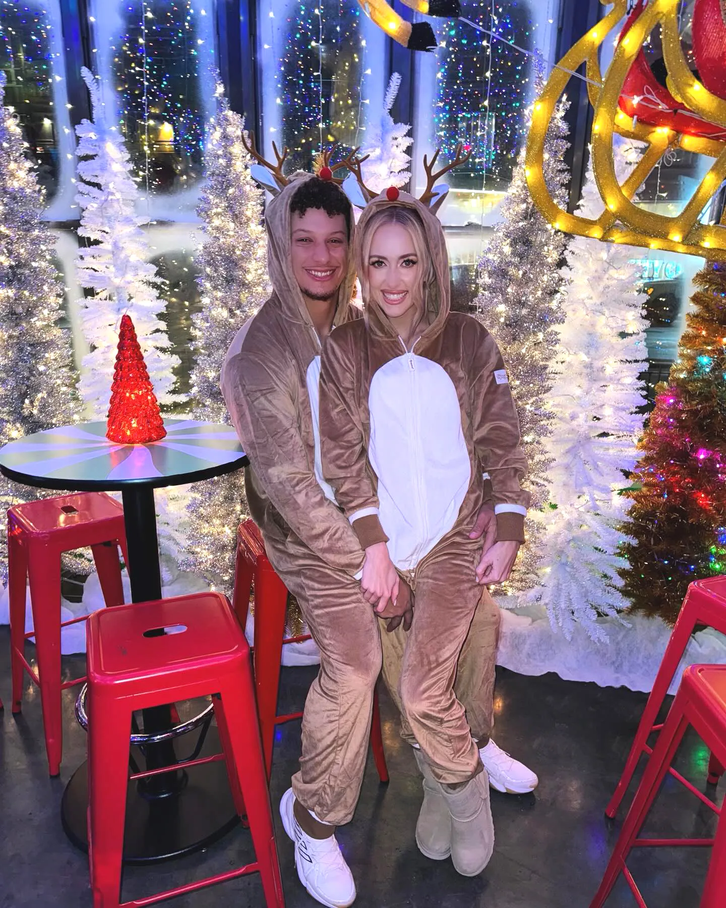 Patrick Mahomes and Wife Brittany Twin in Reindeer Onesies at 'Jolly' Holiday Bash