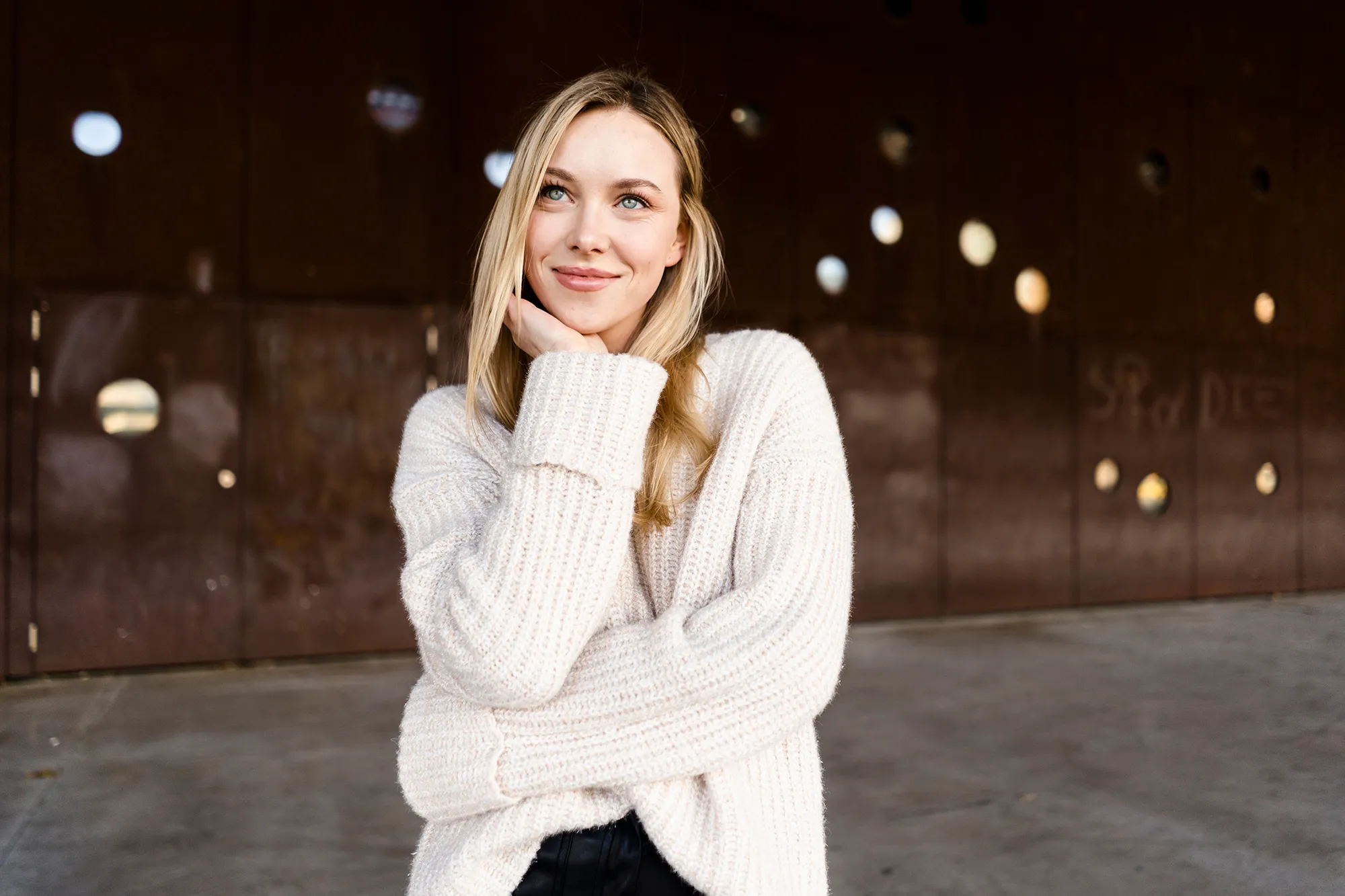 Portrait of smiling young woman outdoors