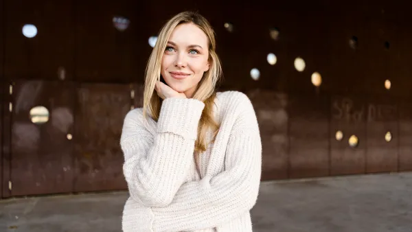 Portrait of smiling young woman outdoors