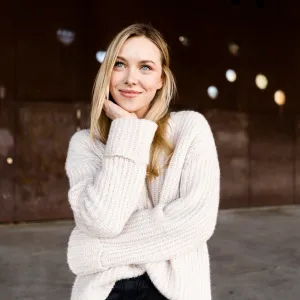 Portrait of smiling young woman outdoors