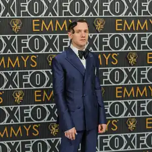 Chris Perfetti Sports Artfully Gelled Hair and a Sharp Navy Suit at the 2023 Emmys