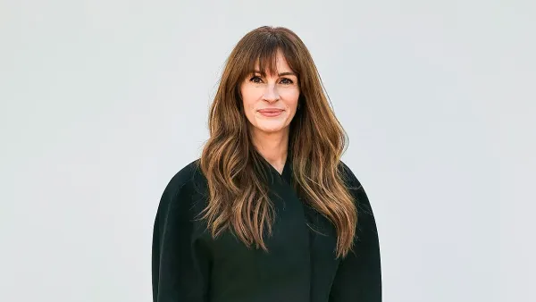 Julia Roberts Looks Sleek in Black Coat Dress at Jacquemus Fashion Show