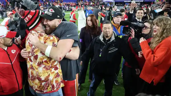 Jason Kelce and Travis Kelce with Taylor Swift