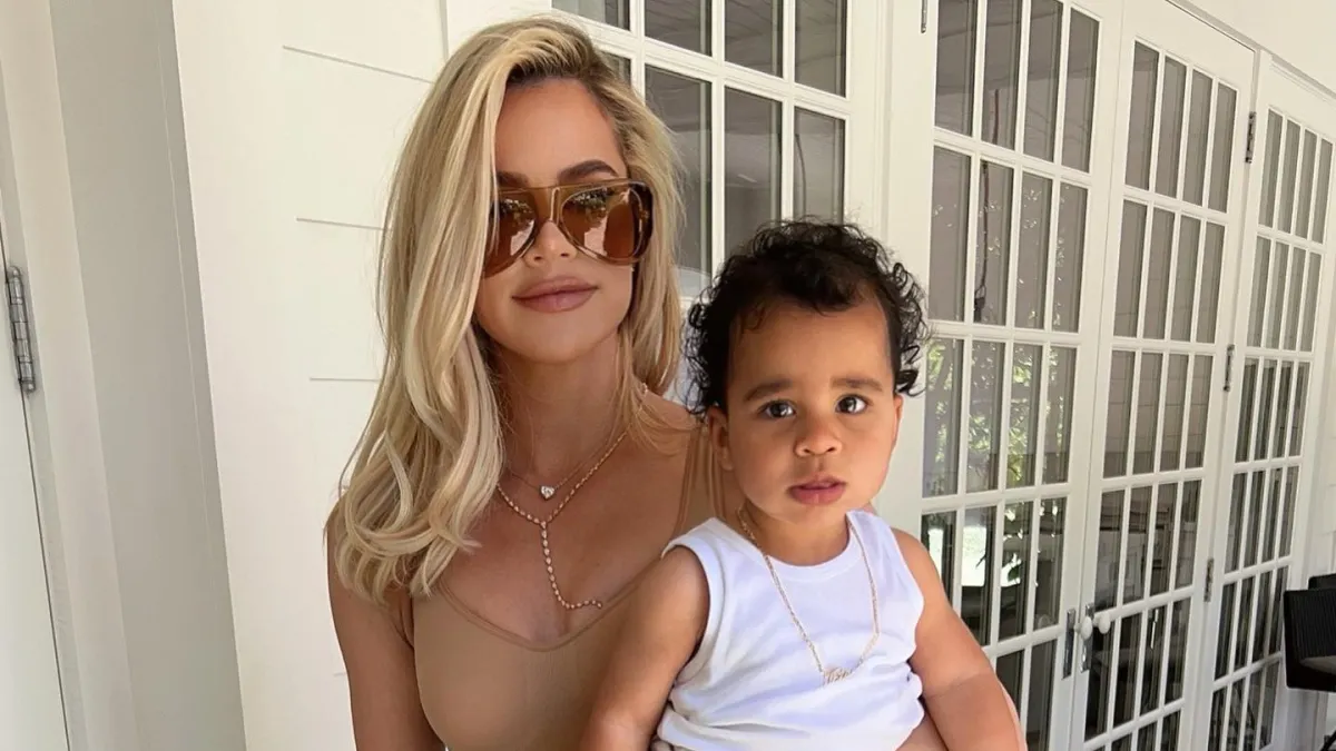 Khloe Kardashian Shows Off Hungry Son Tatum in a Food Stained Bathrobe