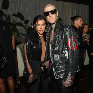 Kourtney Kardashian Cheers on Travis Barker During New Year s Half Marathon