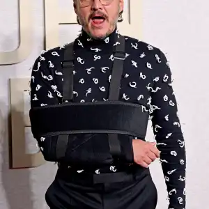 Pedro Pascal Had Hidden Message About His Arm Injury With Golden Globes Outfit