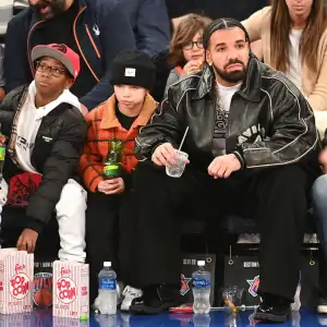 Drake and Son Adonis Sit Courtside at New York Knicks Game