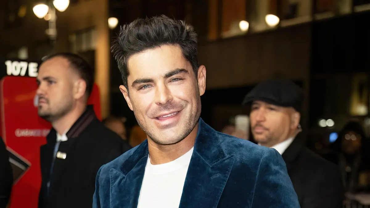 Shirtless Zac Efron Cuddling a Dog Is Exactly What You Need to See to Ward Off Sunday Scaries