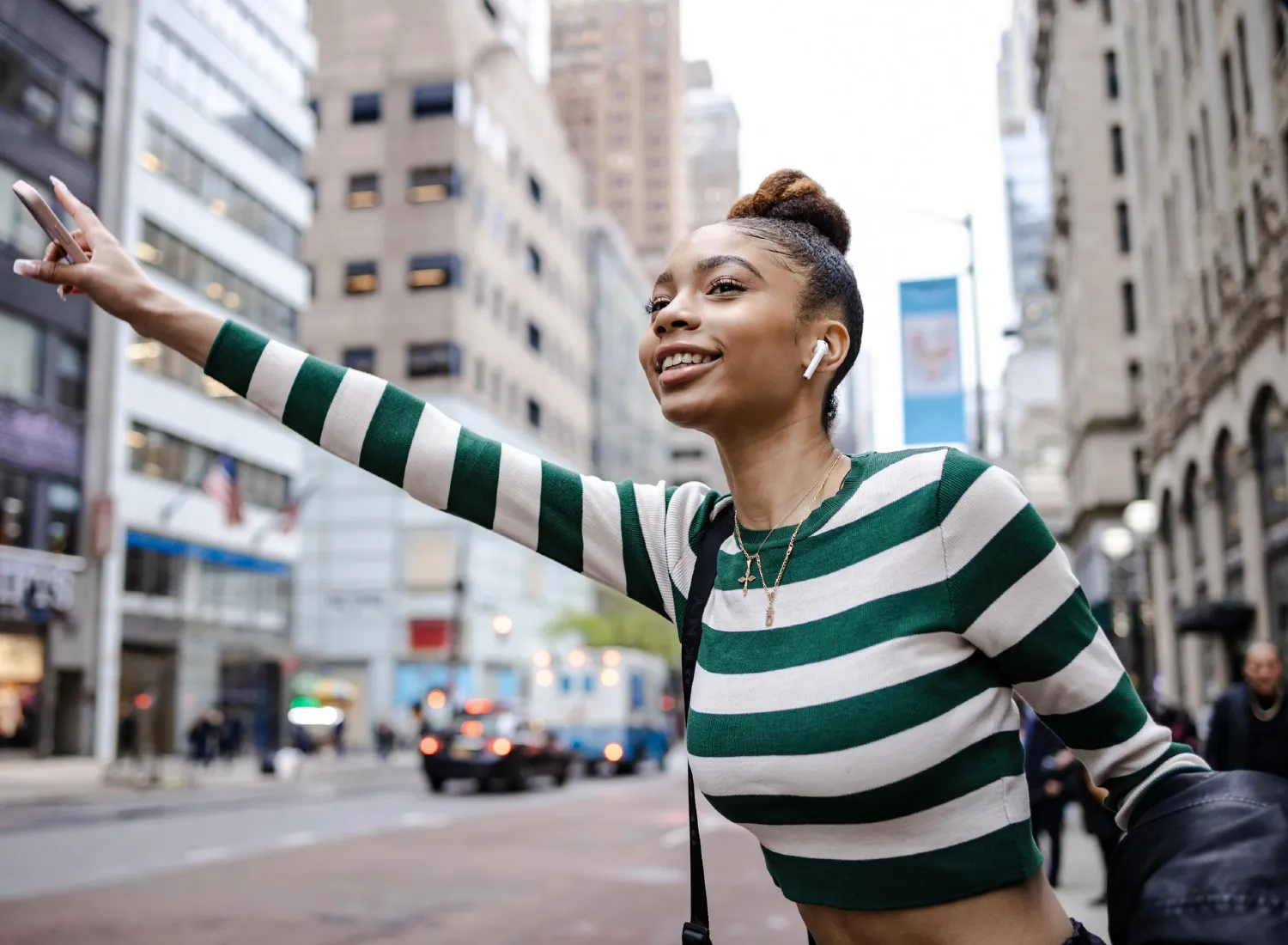 Woman wearing a striped long sleeve crop top