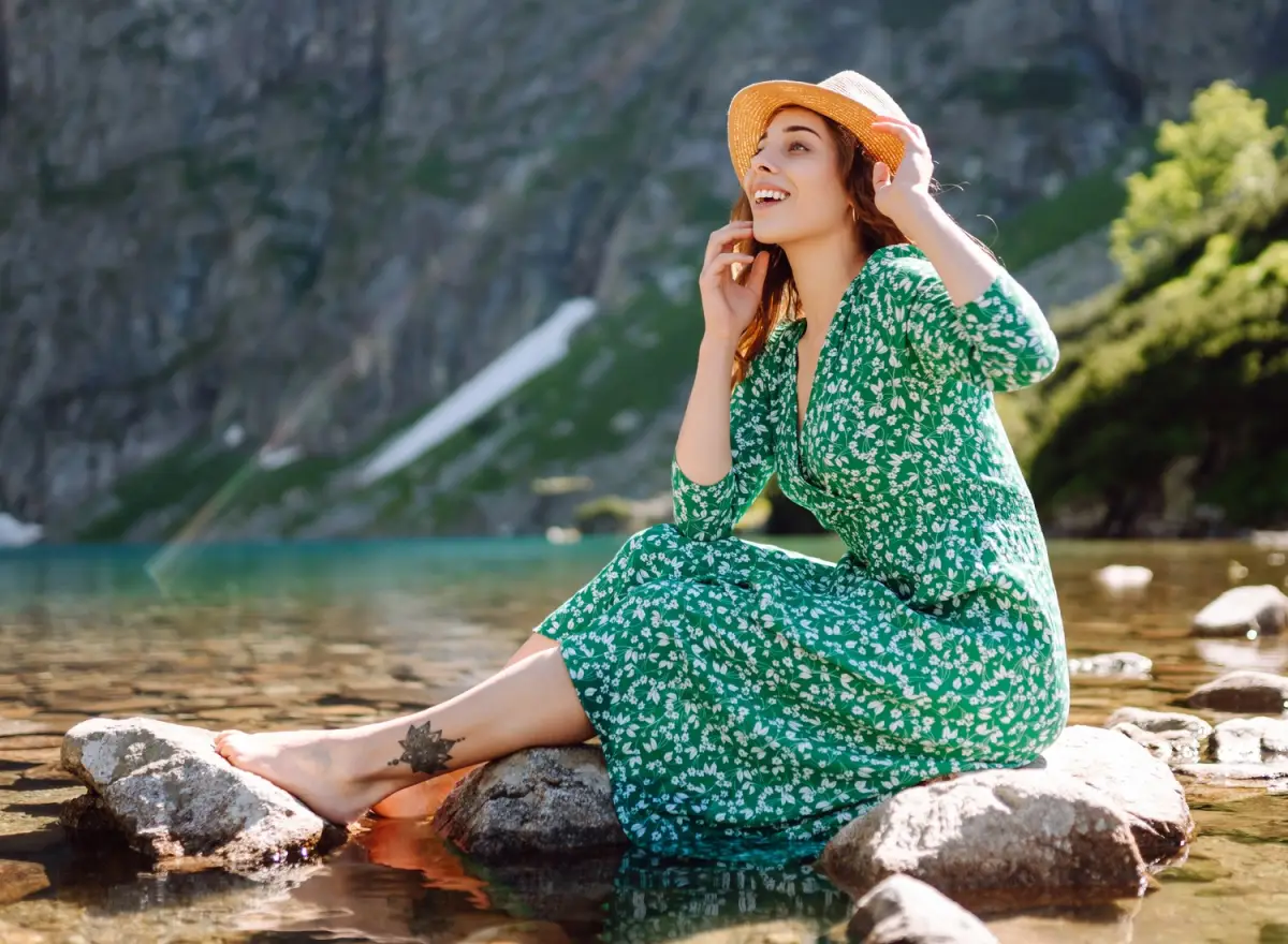 Woman in a green tunic dress