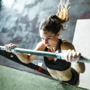 Woman exercising with chin-ups