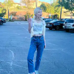 Tori Spelling Sends a Clear Message With Middle Finger Pic and T-Shirt About Not Giving 'A S–t'