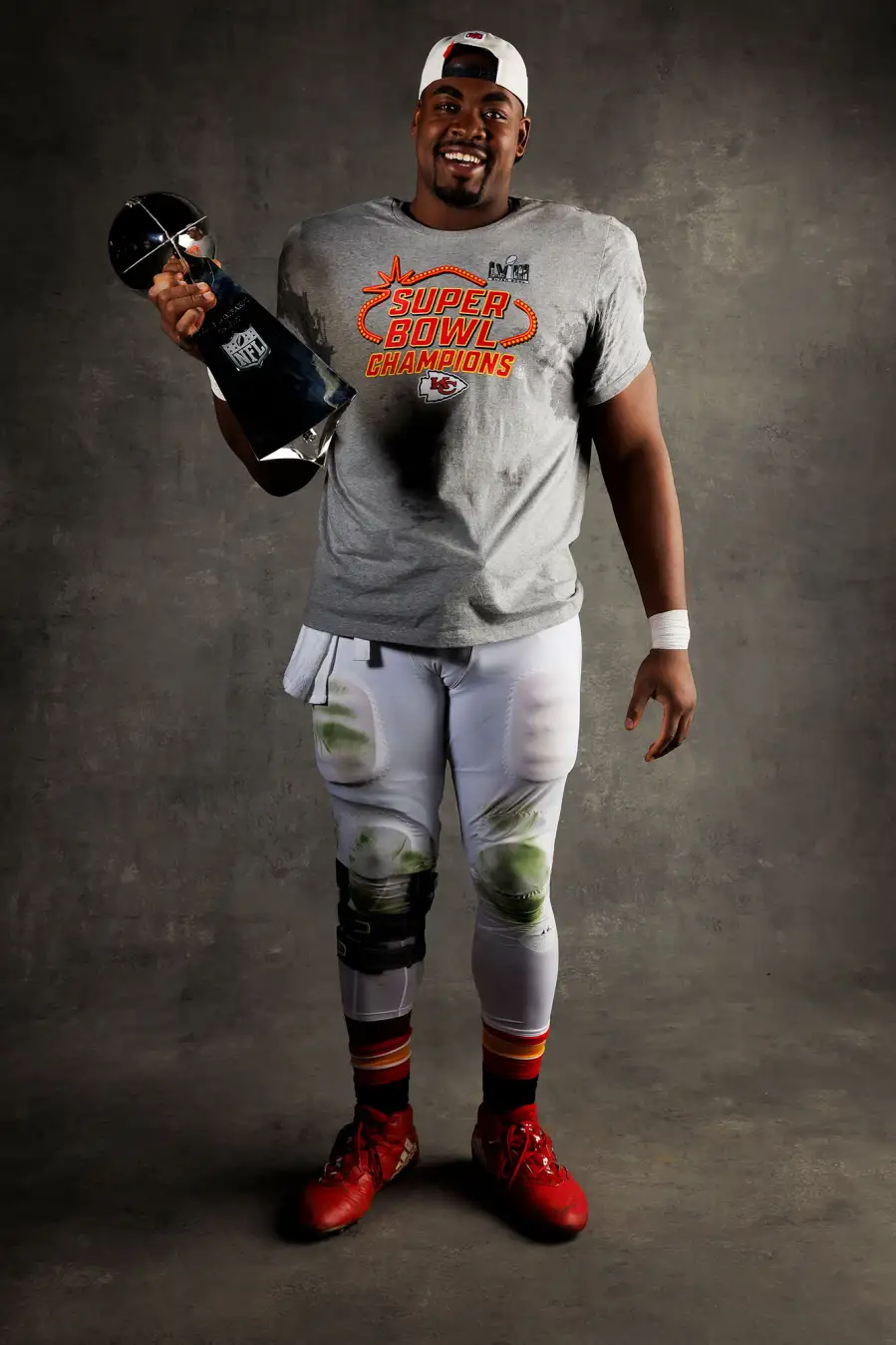 Chris Jones Kansas City Chiefs Players Kiss Vince Lombardi Trophy in Super Bowl LVIII Winners Portraits