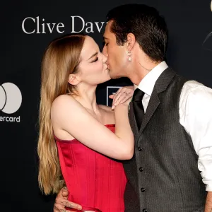 Dove Cameron Confirms Damiano David Romance With a Steamy Kiss During Pre-Grammys Gala Red Carpet
