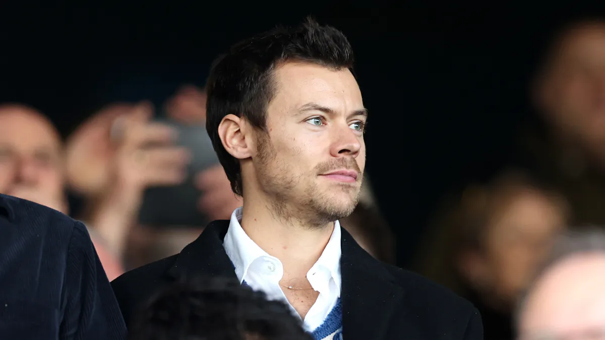 Harry Styles Shows Off Longer Hair at British Soccer Game After Growing Out His Shaved Locks