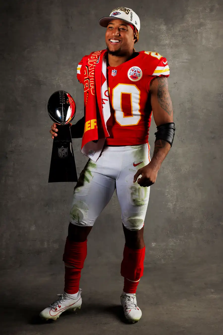 Justin Reid Kansas City Chiefs Players Kiss Vince Lombardi Trophy in Super Bowl LVIII Winners Portraits