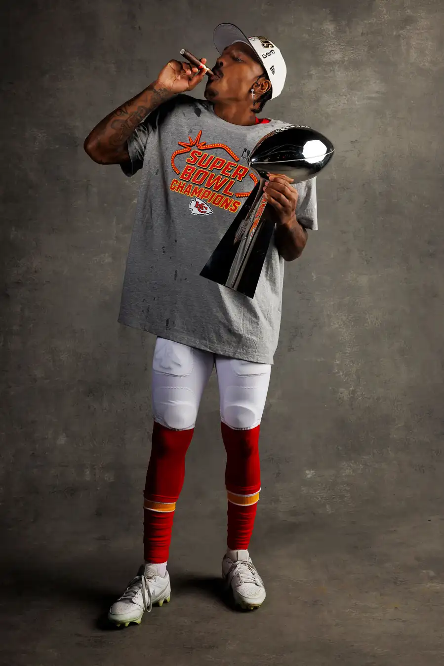 Mecole Hardman Jr Kansas City Chiefs Players Kiss Vince Lombardi Trophy in Super Bowl LVIII Winners Portraits