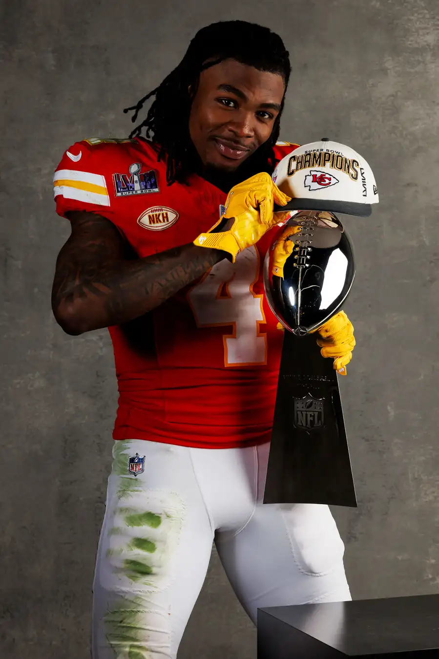 Rashee Rice Kansas City Chiefs Players Kiss Vince Lombardi Trophy in Super Bowl LVIII Winners Portraits