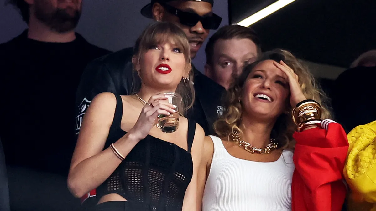 Taylor Swift Matches Travis Kelce With Black Outfit at 2024 Super Bowl