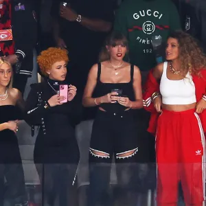 Taylor Swift Matches Travis Kelce With Black Outfit at 2024 Super Bowl