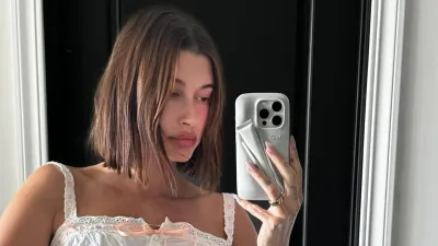 Hailey Bieber Made Us Realize We Need a Phone Case Equipped With a Lip Gloss Holder