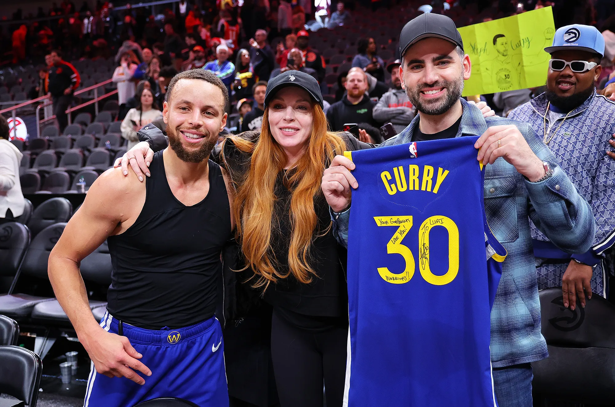 Steph Curry and Lindsay Lohan Have Sweet Interaction at Golden State Warriors Game