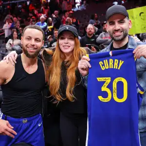 Steph Curry and Lindsay Lohan Have Sweet Interaction at Golden State Warriors Game