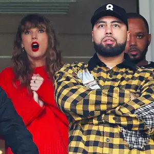 Taylor Swift Seemingly Encourages Travis Kelces Pal Ross Travis to Feed Lion at Sydney Zoo