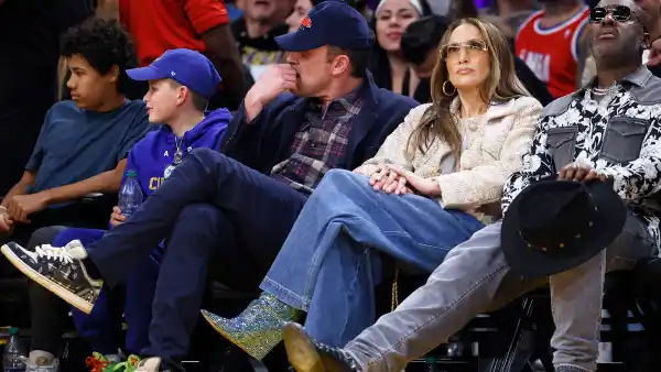 Jennifer Lopez Makes a Compelling Case For Wearing Impractical Sequin Boots at a Basketball Game