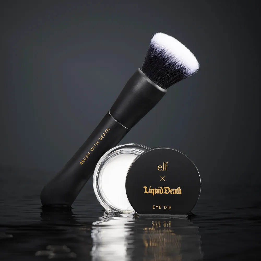 Julia Fox Walks Her Dog in Liquid Death Glam